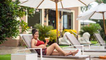 Outdoor pool, pool umbrellas, pool loungers