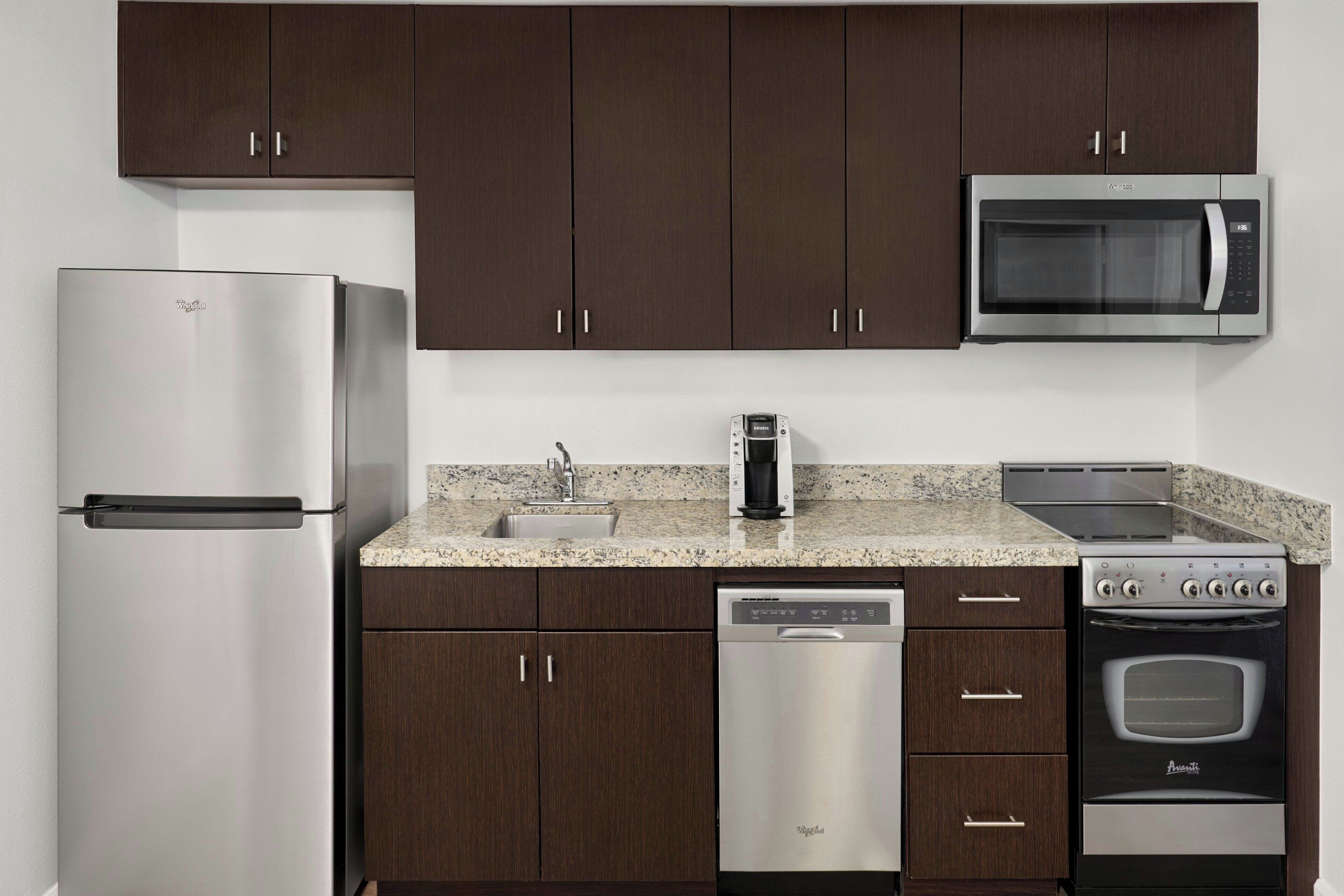 Suite, 2 Bedrooms | Desk, iron/ironing board, free WiFi, alarm clocks