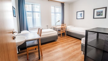 Triple Room, Shared Bathroom | Desk, free WiFi, bed sheets