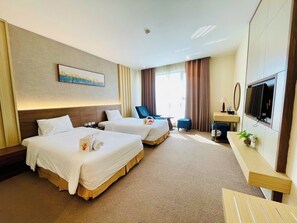 ห้องดีลักซ์ทวิน, 1 ห้องนอน | เครื่องนอนระด ับพรีเมียม, มินิบาร์, ตู้นิรภัยในห้องพัก, โต๊ะทำงาน