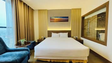 Habitación doble Deluxe, 1 cama King size | Ropa de cama de alta calidad y minibar