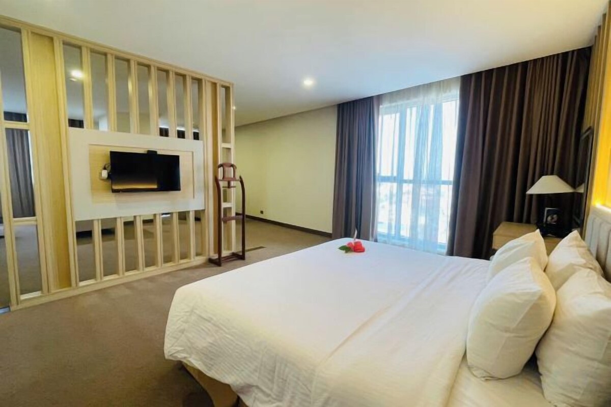 Luxe beddengoed, een minibar, een kluis op de kamer, een bureau