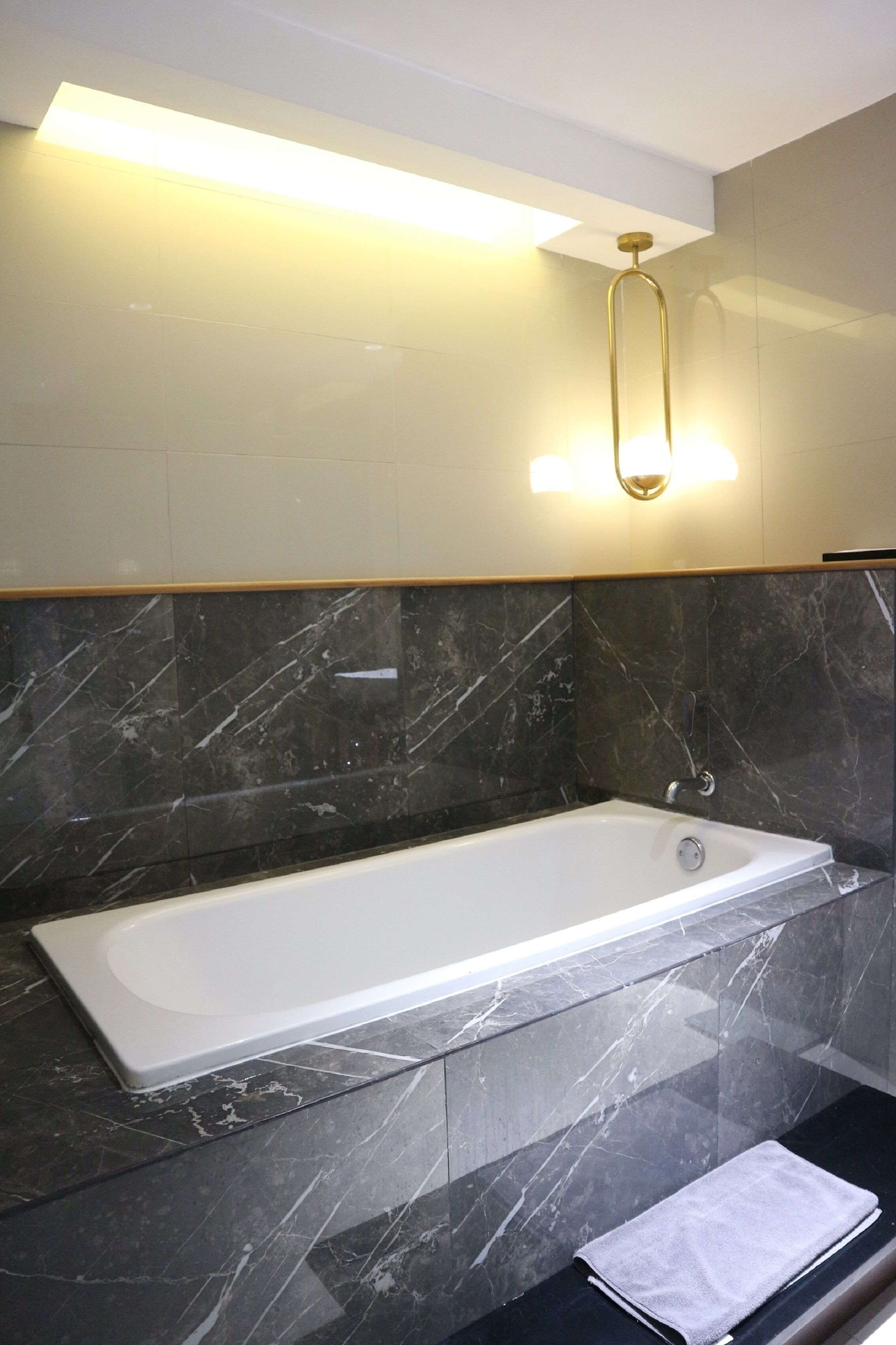 premier suite, 1 king bed | bathroom | shower, free toiletries, slippers, towels