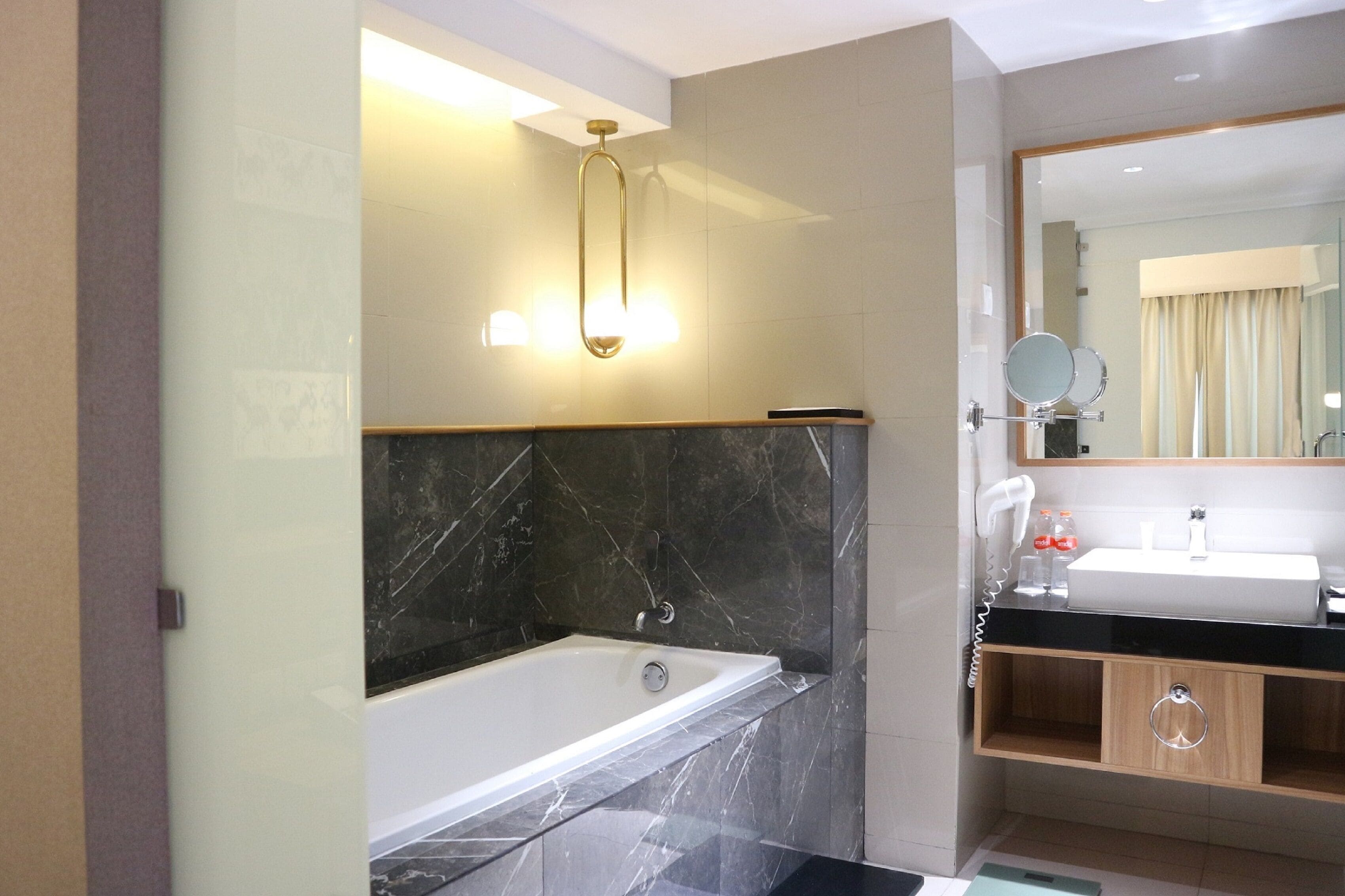 premier suite, 1 king bed | bathroom | shower, free toiletries, slippers, towels