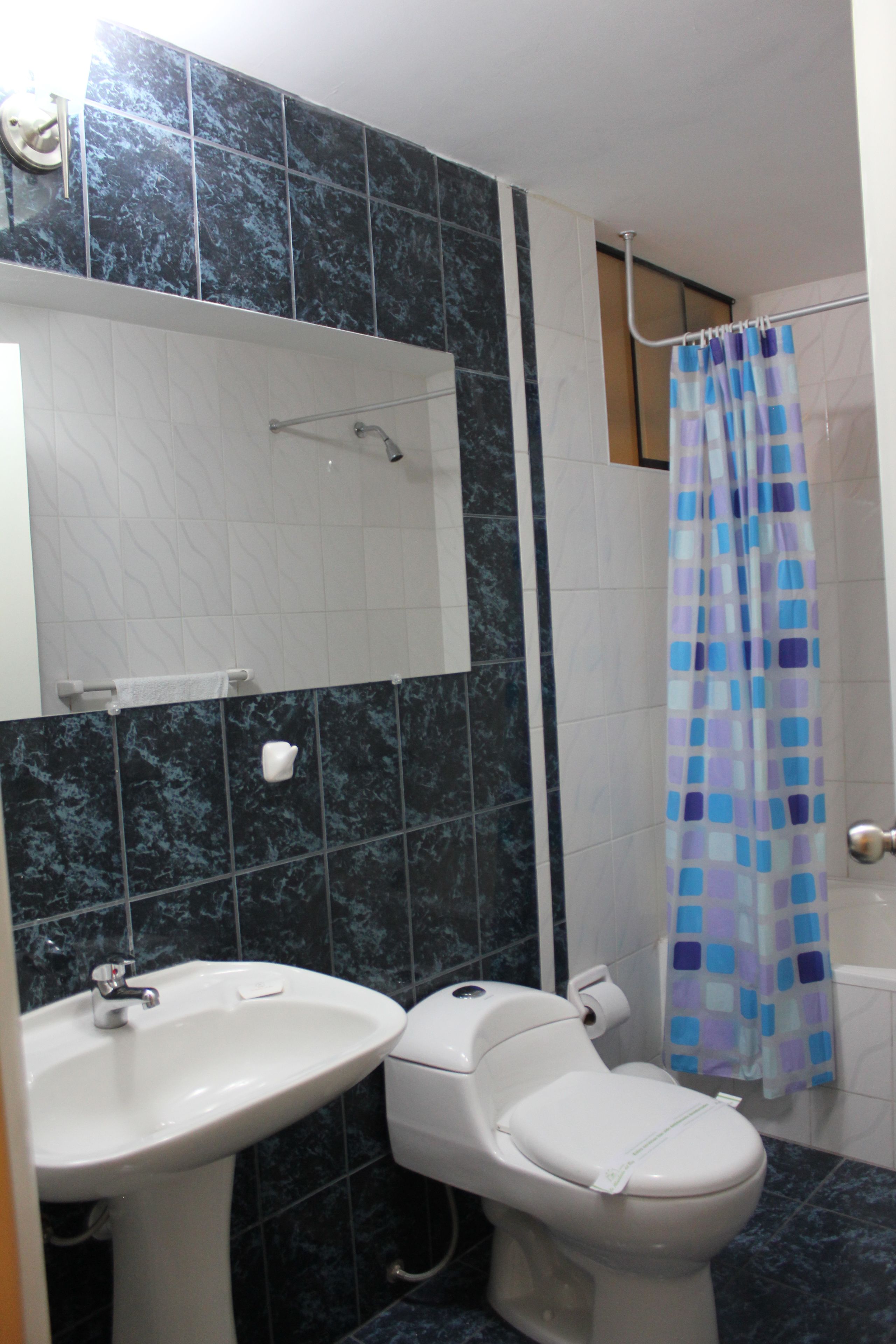 junior suite | bathroom | shower, hair dryer, towels