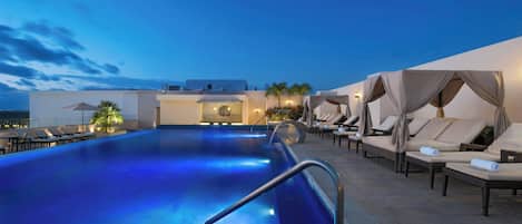Outdoor pool, open 8 AM to 8 PM, free pool cabanas, pool umbrellas