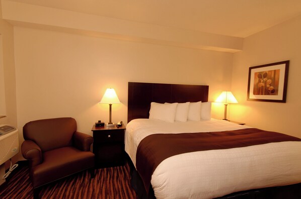 Premium bedding, down duvets, in-room safe, desk