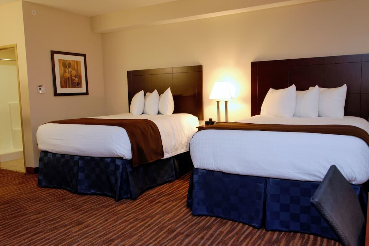 family suite, multiple beds | premium bedding, down duvets, in-room safe, desk