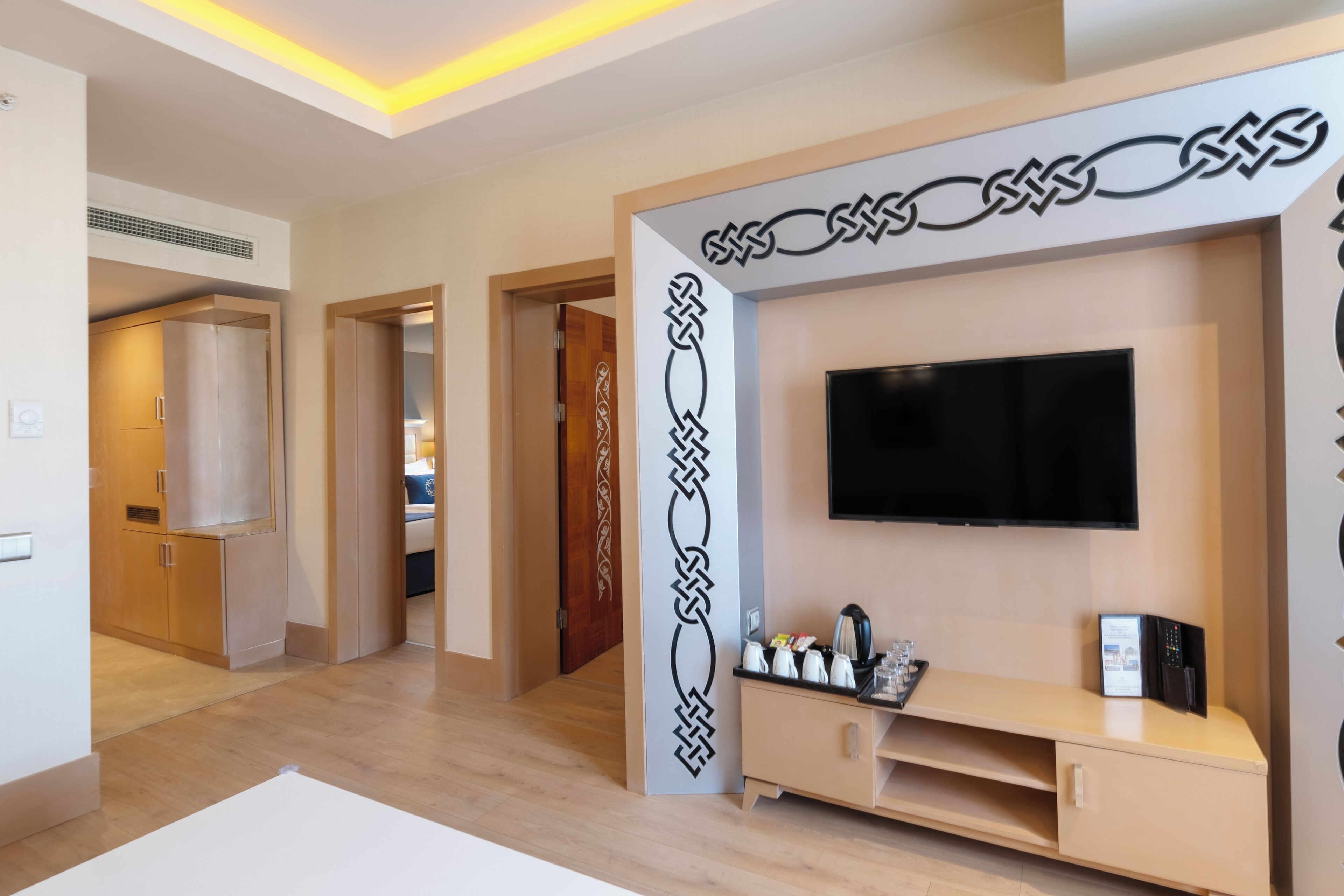 family suite, 2 bedrooms, sea view | living area | 82-cm lcd tv with satellite channels, tv, ping pong