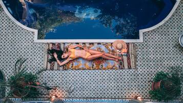 2 outdoor pools, pool umbrellas, pool loungers