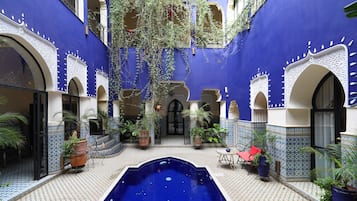 2 outdoor pools, pool umbrellas, pool loungers