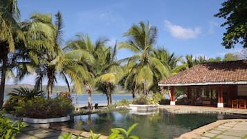 Outdoor pool, open 8:00 AM to 6:00 PM, pool umbrellas, sun loungers