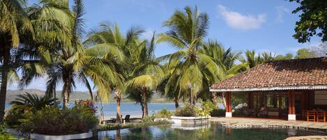 Outdoor pool, open 8:00 AM to 6:00 PM, pool umbrellas, pool loungers