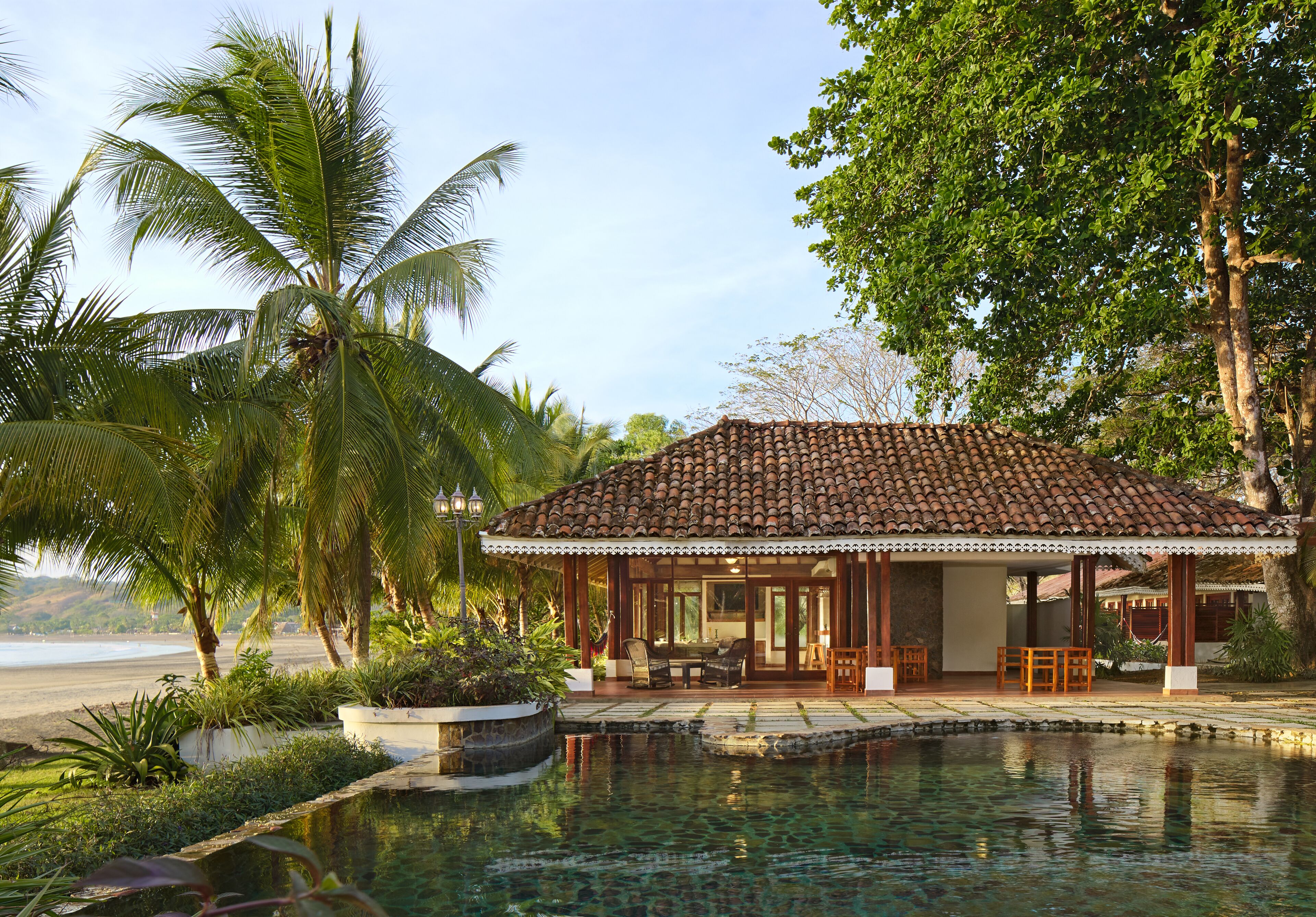 Outdoor pool, open 8:00 AM to 6:00 PM, pool umbrellas, pool loungers