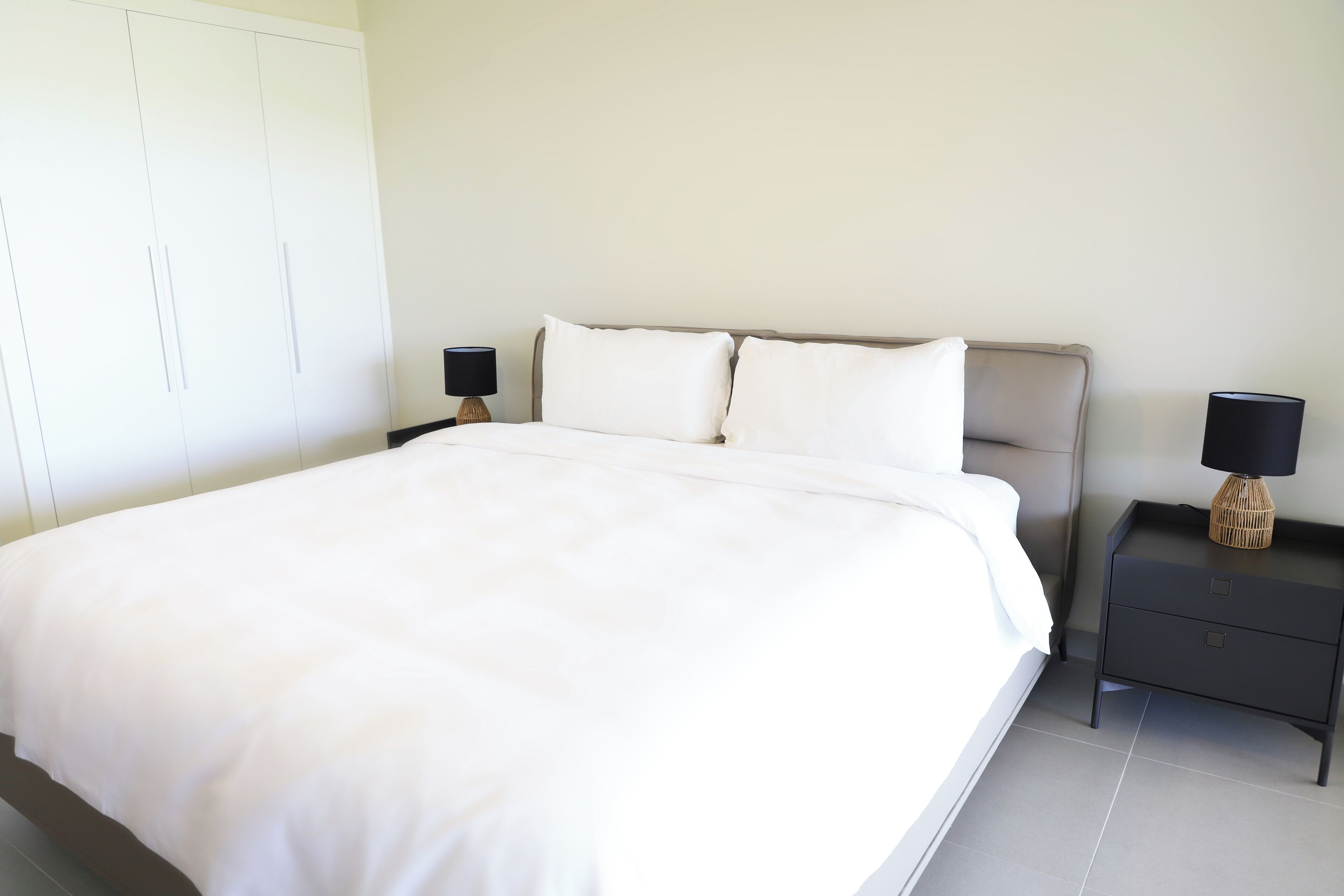 ดีลักซ์คอนโด, 4 ห้องนอน, เห็นวิวมหาสมุทรบางส่วน, ติดสวน | เครื่องนอนระดับพรีเมียม, ตู้นิรภัยในห้องพัก, ผ้าม่านกันแสง