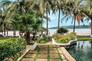 On the beach, free beach cabanas, sun-loungers, beach towels