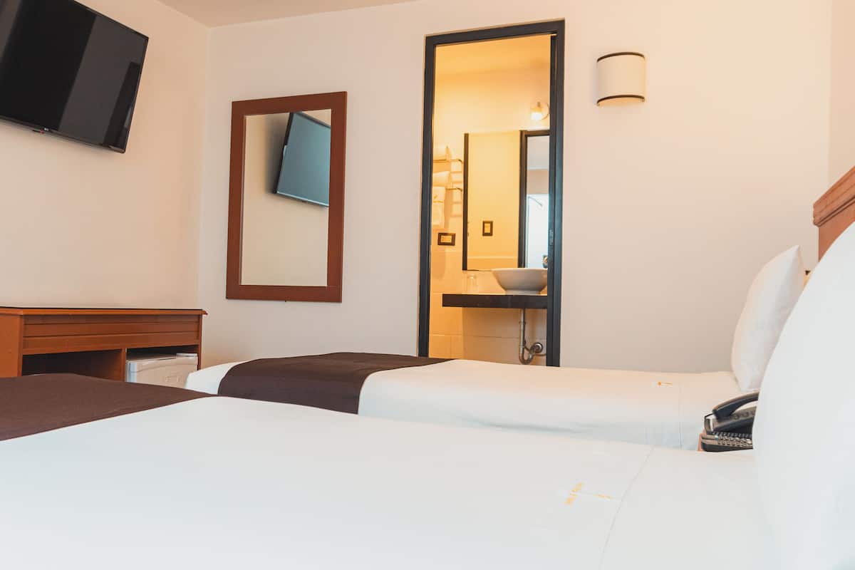 Premium bedding, pillowtop beds, minibar, in-room safe