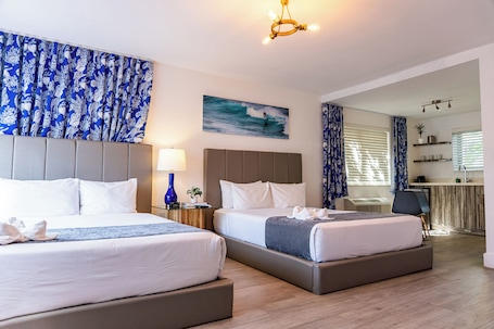 Accessible Studio Double Queen | Premium bedding, memory foam beds, in-room safe, laptop workspace