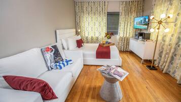 Studio Queen | Premium bedding, memory-foam beds, in-room safe, laptop workspace