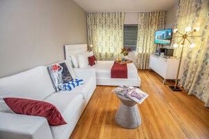 Studio Queen | Premium bedding, memory foam beds, in-room safe, laptop workspace