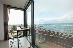 Premium bedding, pillowtop beds, desk, blackout drapes