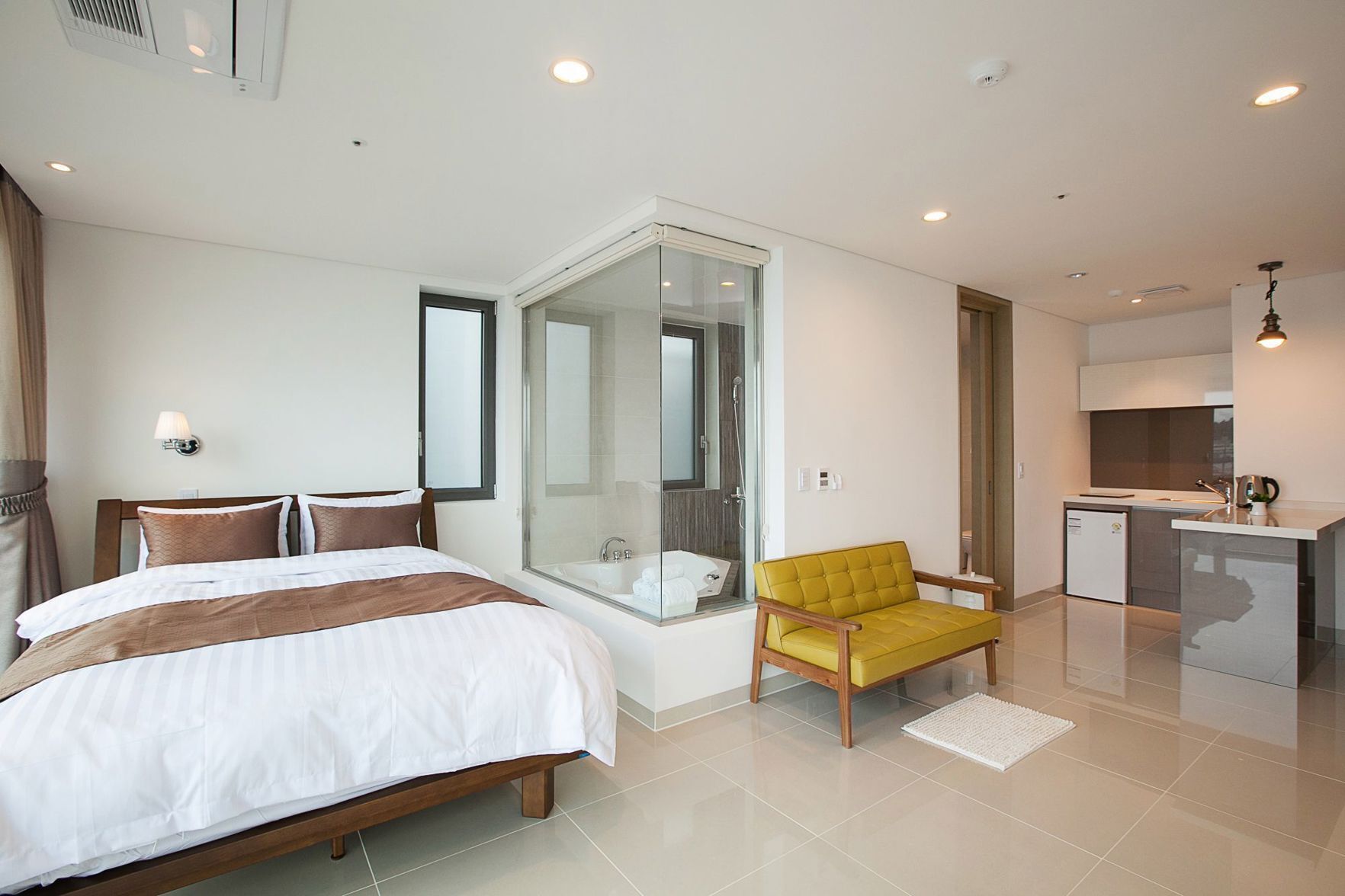 Premium bedding, pillow-top beds, desk, blackout curtains