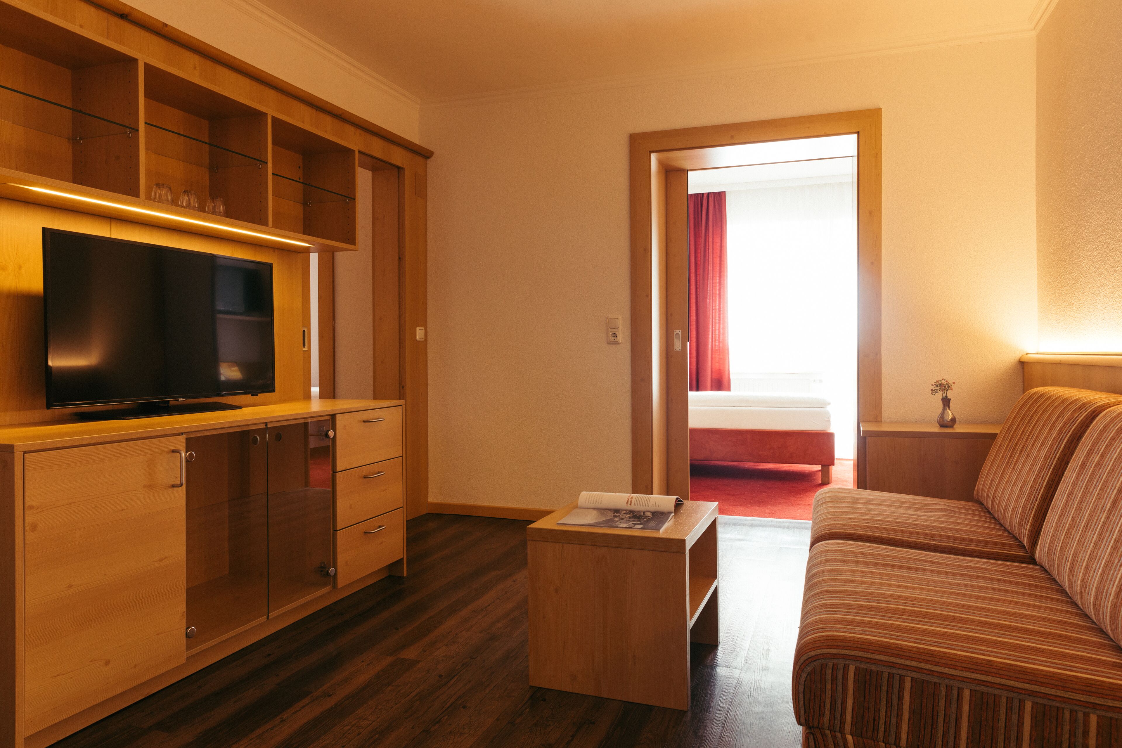 family suite, 3 bedrooms, balcony | living area | flat-screen tv