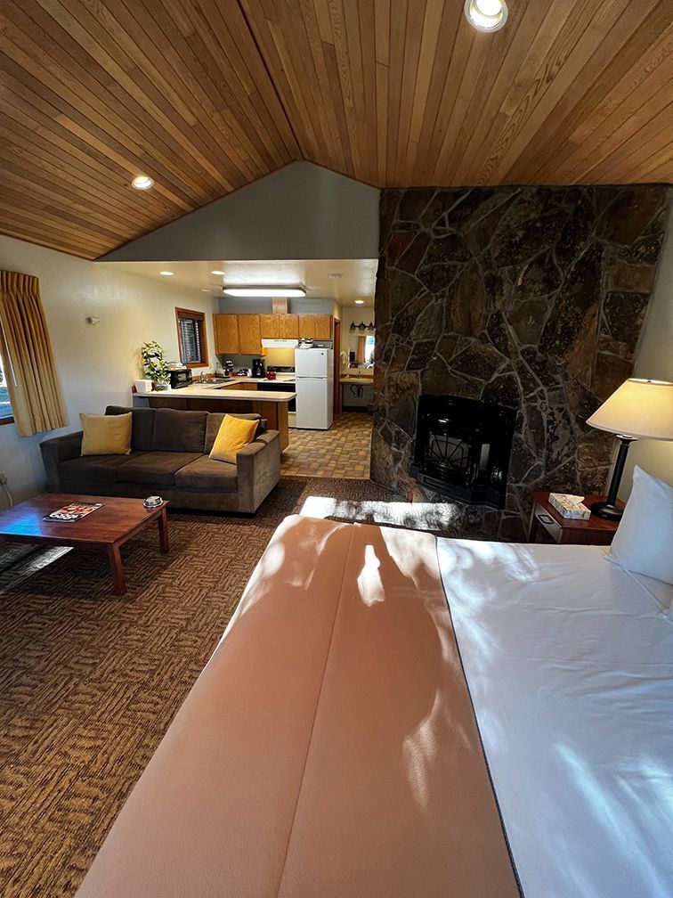 Cottage Suite 2 Queens & Full Kitchen | Living area | 45-inch TV with cable channels