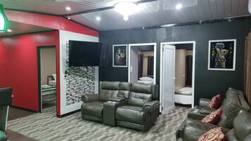 Luxury Apartment | Living area | Flat-screen TV