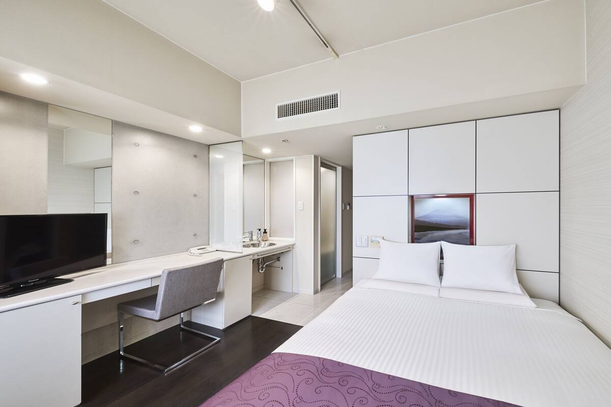 Couette en duvet d'oie, coffres-forts dans les chambres, bureau
