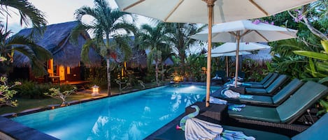 Outdoor pool, pool umbrellas, sun loungers