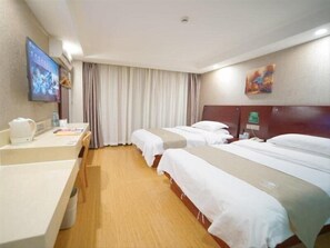 A hotel room with two beds, a desk, a TV, and a window with curtains. - Greentree Inn Shanghai Baoshan Yanghang Shuichan Road Hotel (Shanghai)
