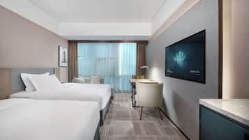 Deluxe Twin Garden View Room | In-room safe, desk, laptop workspace, blackout drapes