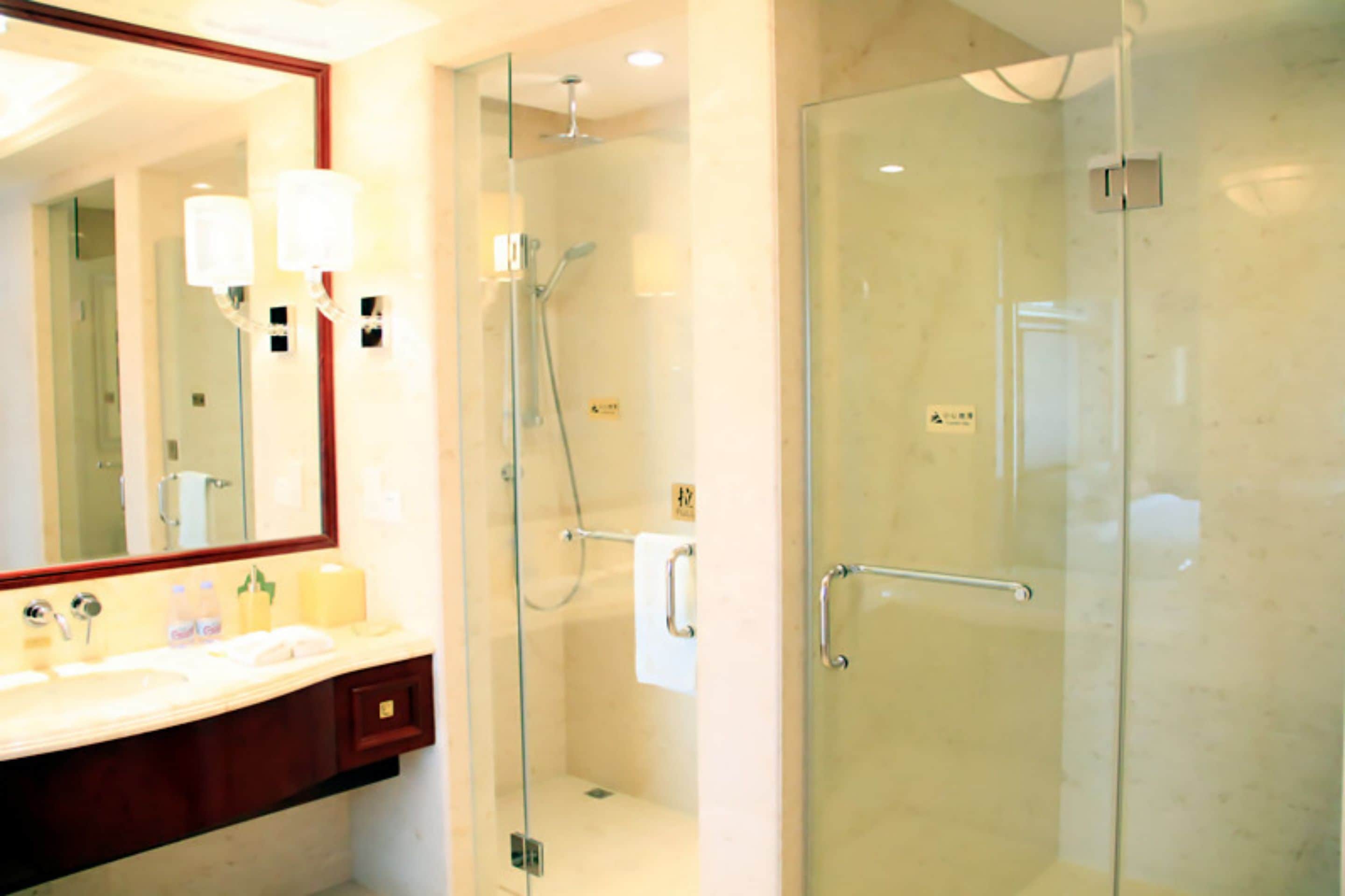 separate bathtub and shower, free toiletries, hair dryer, bathrobes