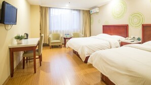 A hotel room with two beds, a desk, a chair, a TV, and a window with curtains. - GreenTree Inn Tianjin Xiqin Development District Dasi Meijiang Exhibition Center Hotel (Tianjin)