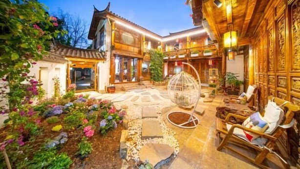 Unclassified image, 1 of 90, button - THREE WELLS INN (Lijiang)