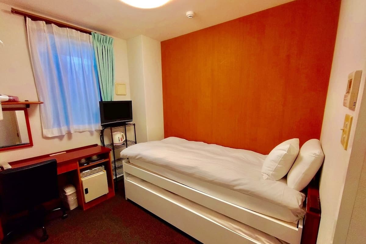 Down duvets, blackout curtains, iron/ironing board, free WiFi