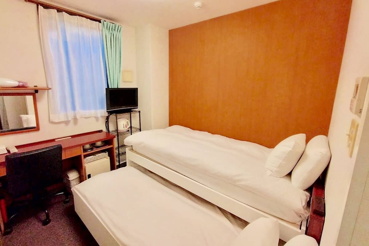 Down duvets, blackout curtains, iron/ironing board, free WiFi