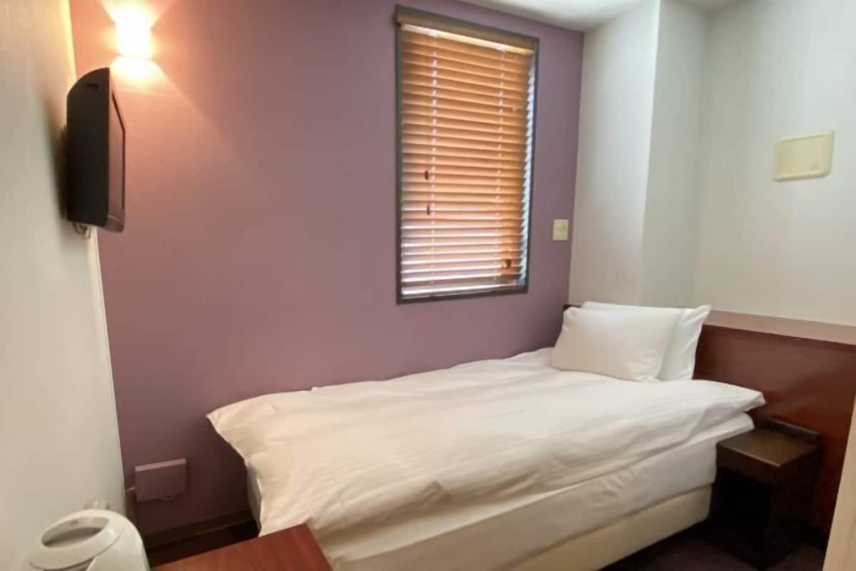 Down duvets, blackout curtains, iron/ironing board, free WiFi