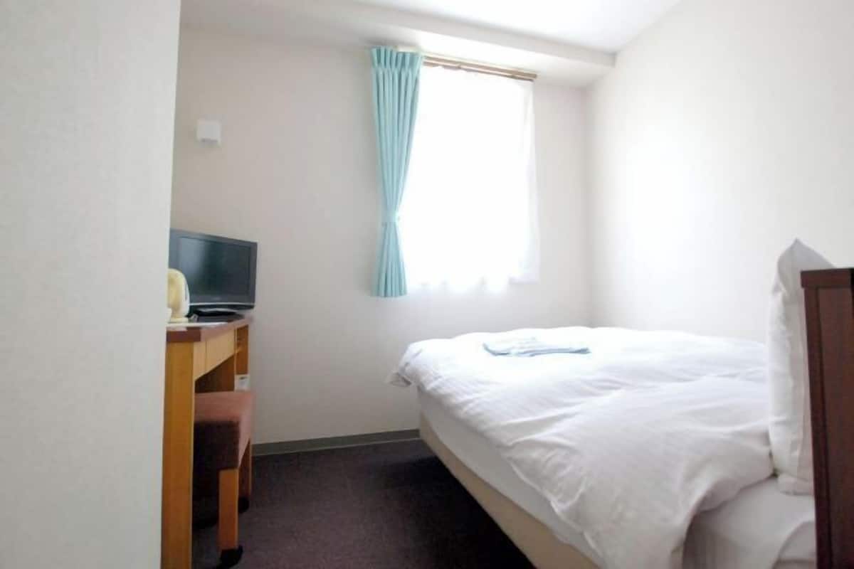 Down duvets, blackout curtains, iron/ironing board, free WiFi