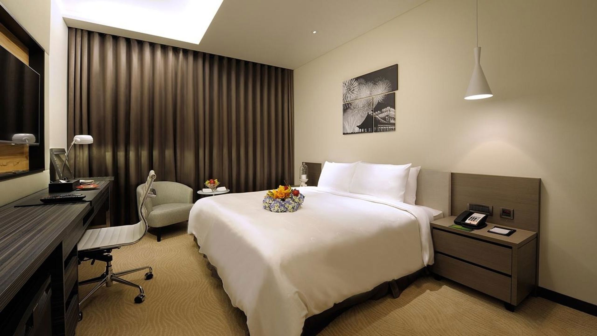 Premium bedding, down comforters, in-room safe, desk