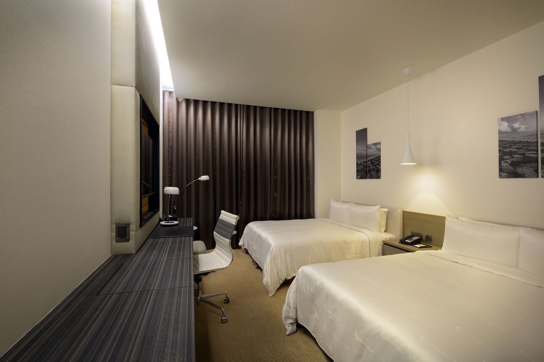 Premium bedding, down comforters, in-room safe, desk