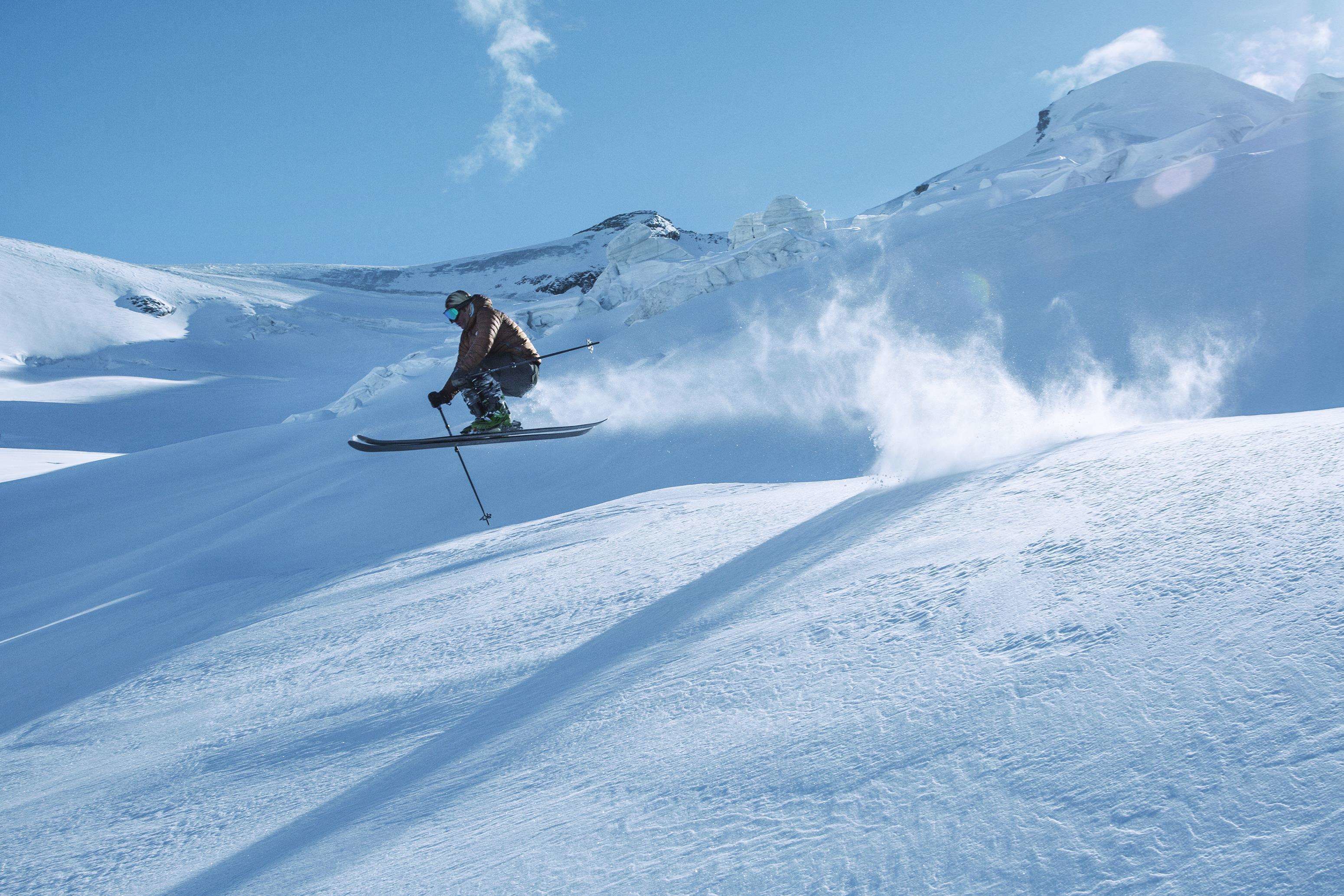 A skier on a snowy slope.