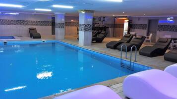 Indoor pool, seasonal outdoor pool, free pool cabanas, pool umbrellas