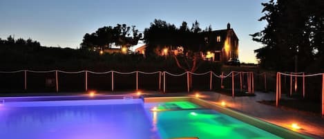 Seasonal outdoor pool, pool umbrellas, pool loungers