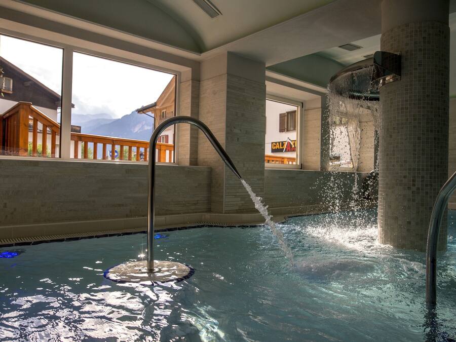 Indoor pool, open 4:00 PM to 8:00 PM, pool loungers