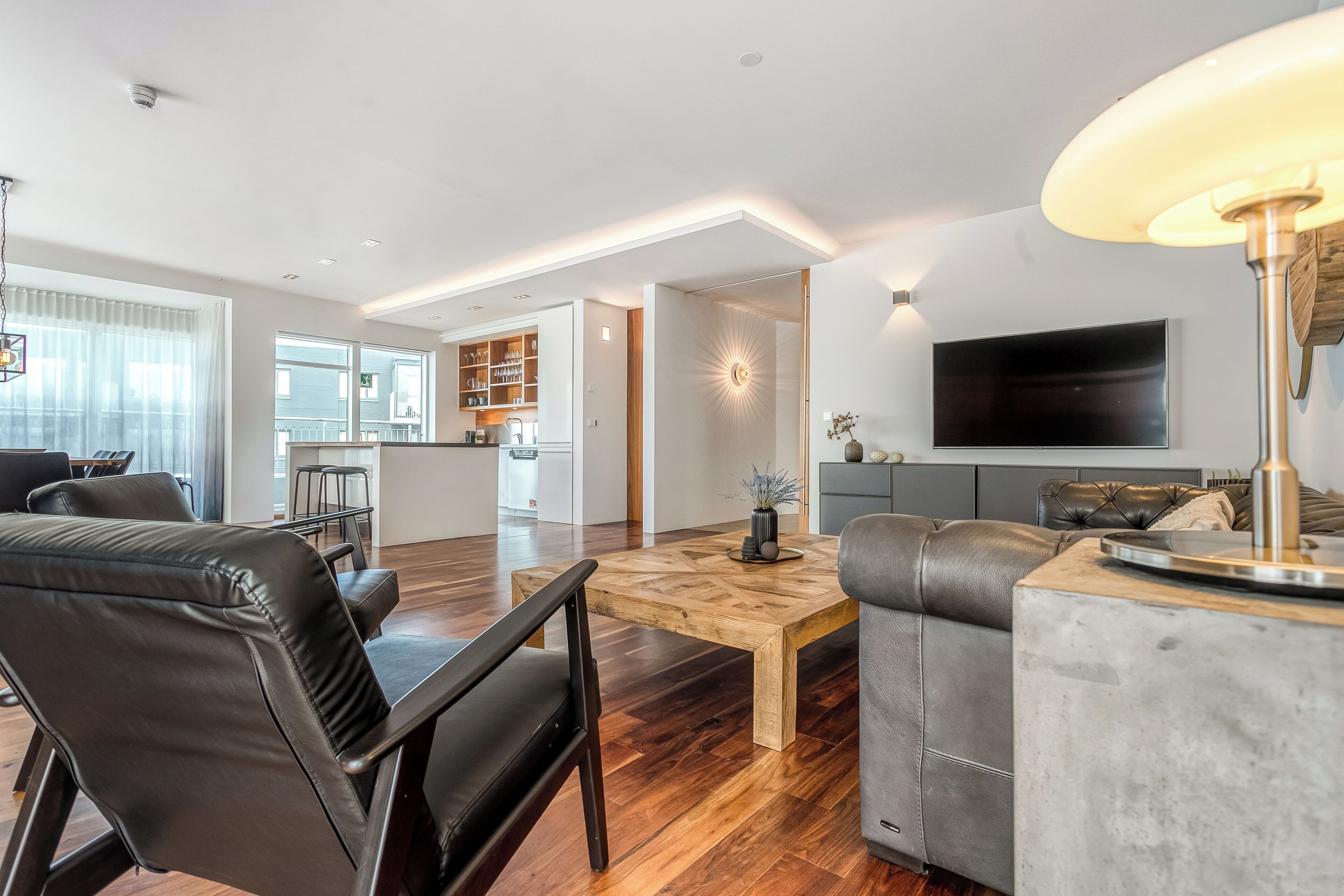 Comfort Penthouse, Balcony | Living area | 55-inch Smart TV with digital channels