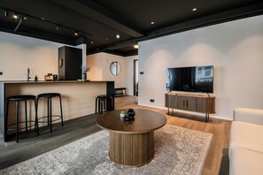 Superior Apartment, 2 Bedrooms, Balcony | Living area | 55-inch Smart TV with digital channels - B2 Apartments by Heimaleiga (Reykjavik)