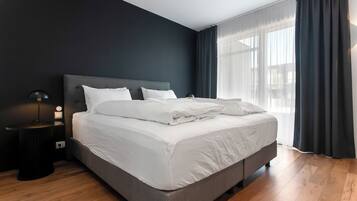 Deluxe Penthouse, Balcony | Down duvets, laptop workspace, blackout curtains, soundproofing