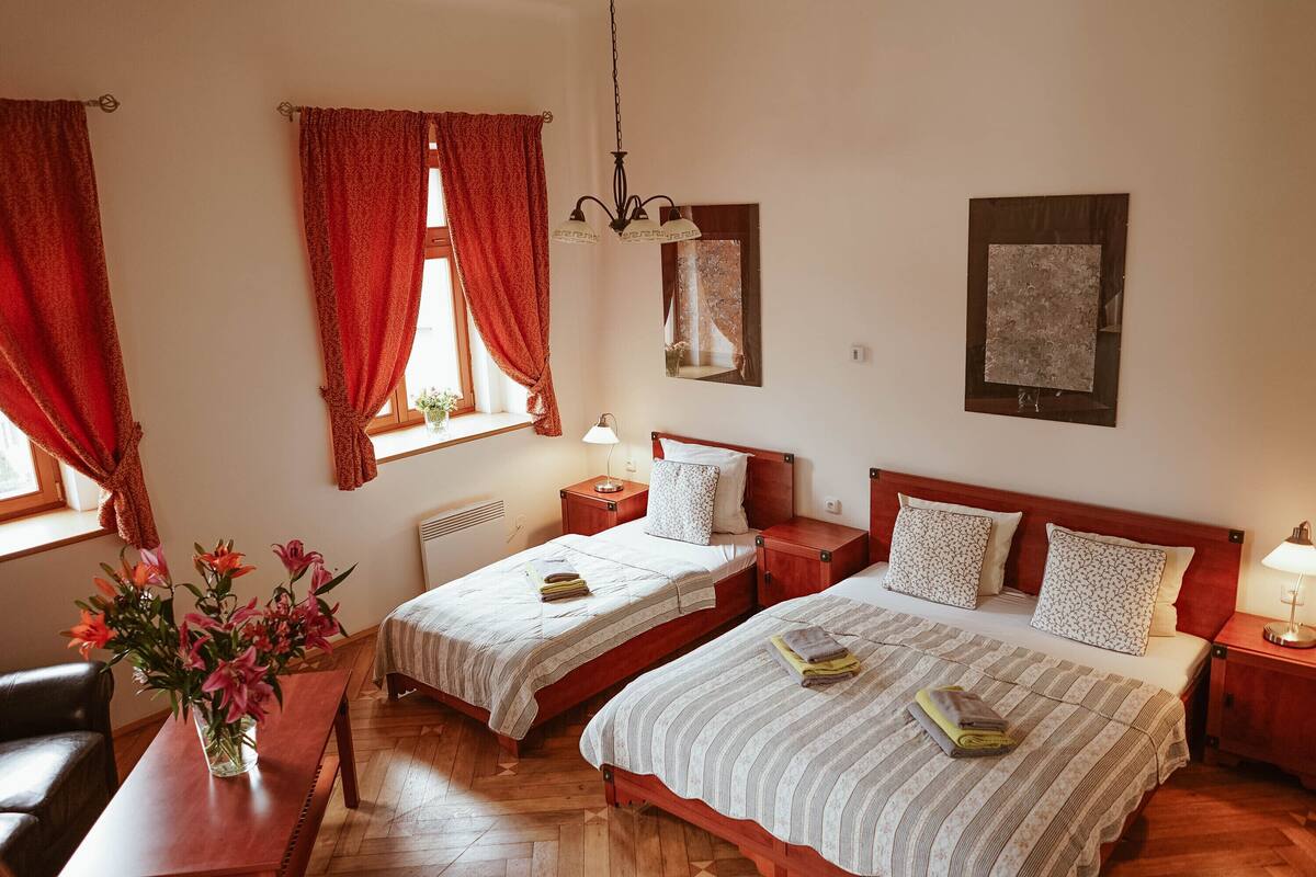 Comfort Triple Room, 1 Bedroom, Kitchenette, Garden View | Desk, blackout drapes, soundproofing, cribs (free)